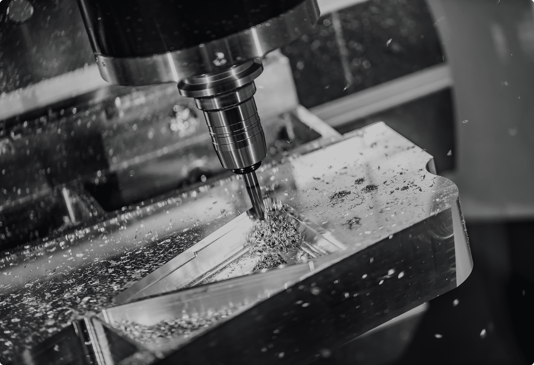 CNC machine cutting metal piece